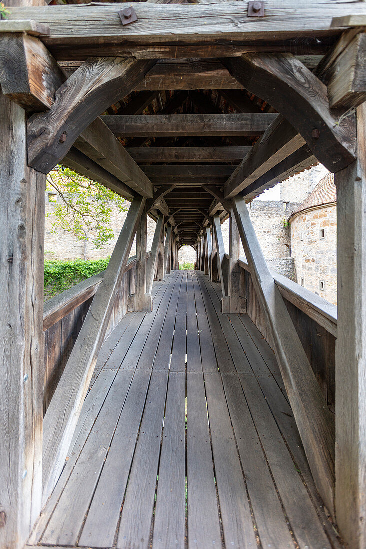 Wooden bridge over the fortification ditch of the Spitalbastei of Rothenburg ob der Tauber, Middle Franconia, Bavaria, Germany