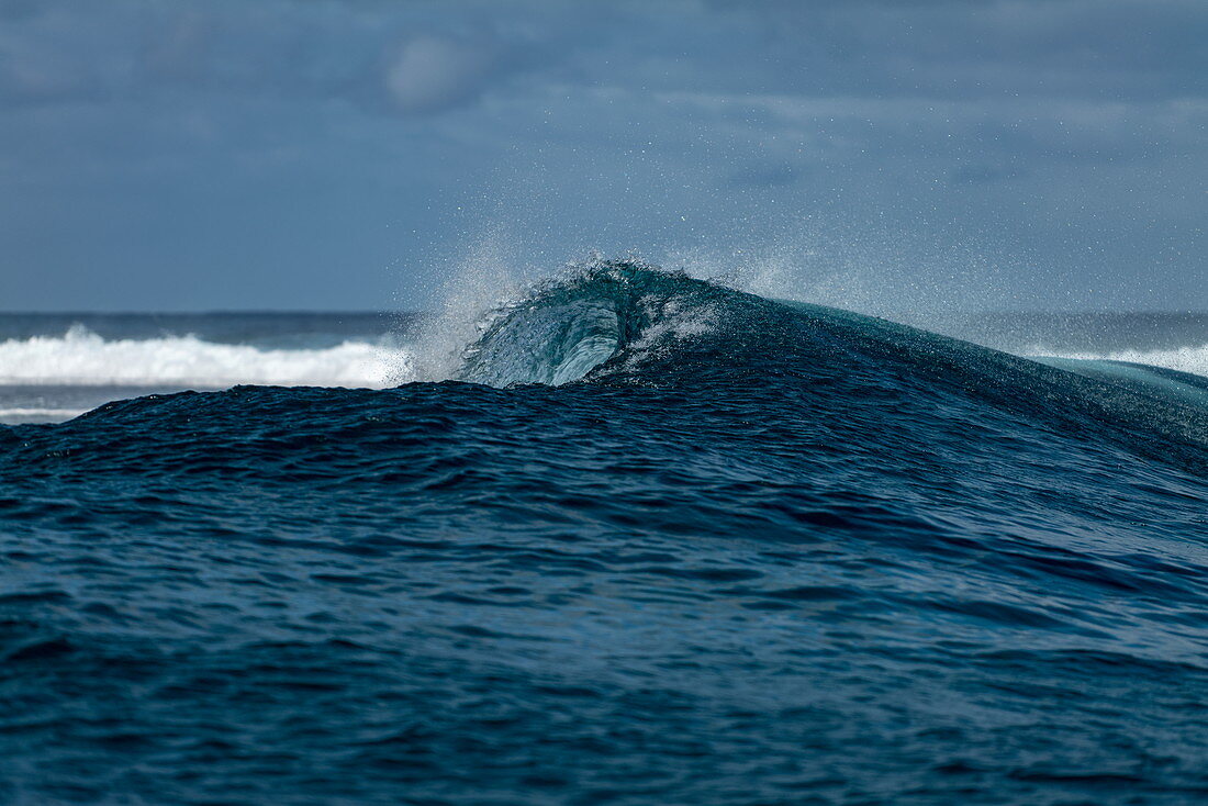Breaking wave in the Teahupoo surfing area, Tahiti Iti, Tahiti, Windward Islands, French Polynesia, South Pacific