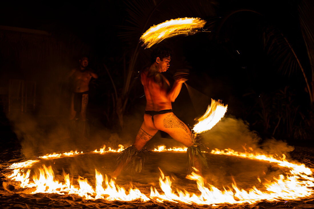 Fire dance during the 'Pacifica' show at the Tiki Village cultural center, Moorea, Windward Islands, French Polynesia, South Pacific