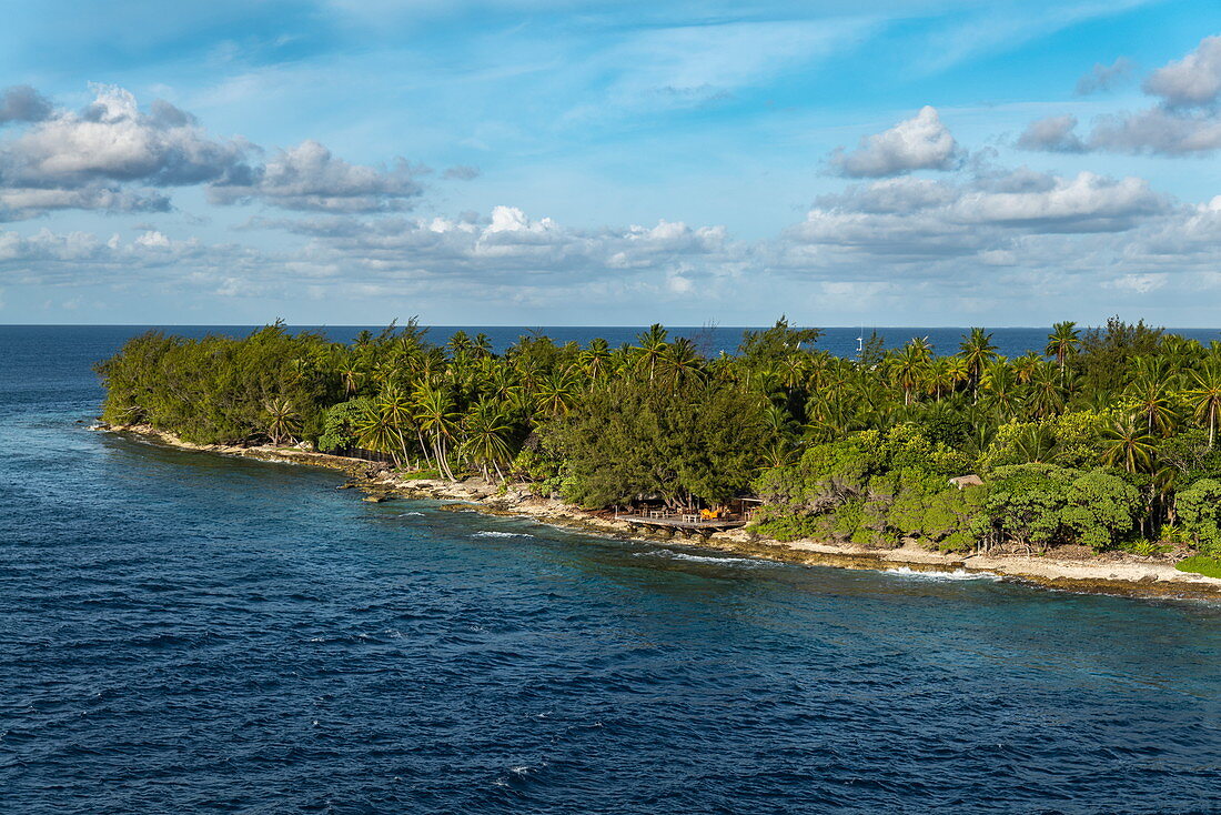 View of Avatoru Island from the passenger cargo ship Aranui 5 (Aranui Cruises) while sailing through the Tiputa Canal into the lagoon, Rangiroa Atoll, Tuamotu Islands, French Polynesia, South Pacific