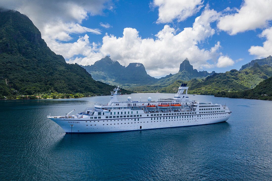 Aerial view of cruise ship in Opunohu Bay, Moorea, Windward Islands, French Polynesia, South Pacific