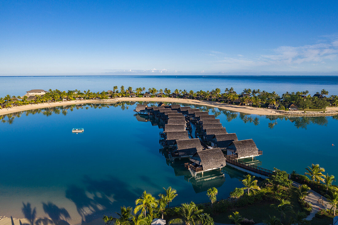 Aerial view of overwater bungalows at Fiji Marriott Resort Momi Bay at sunrise, Momi Bay, Coral Coast, Viti Levu, Fiji Islands, South Pacific