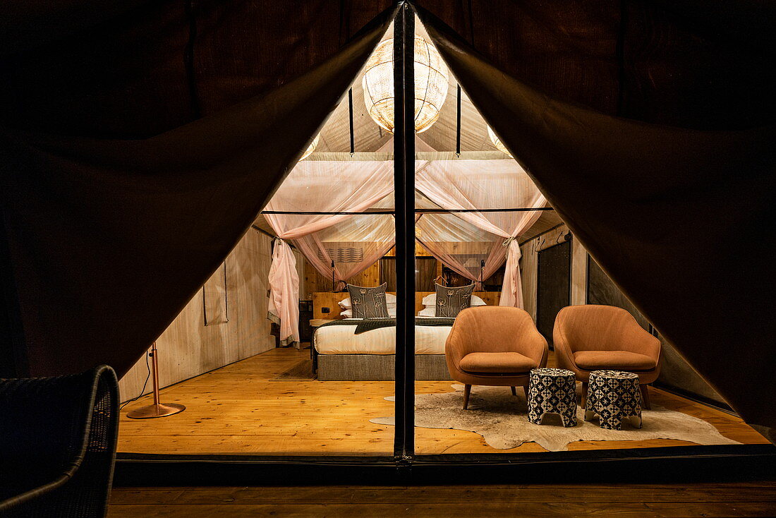 View into a luxury tented accommodation in the luxury resort tent camp Magashi Camp (Wilderness Safaris), Akagera National Park, Eastern Province, Rwanda, Africa