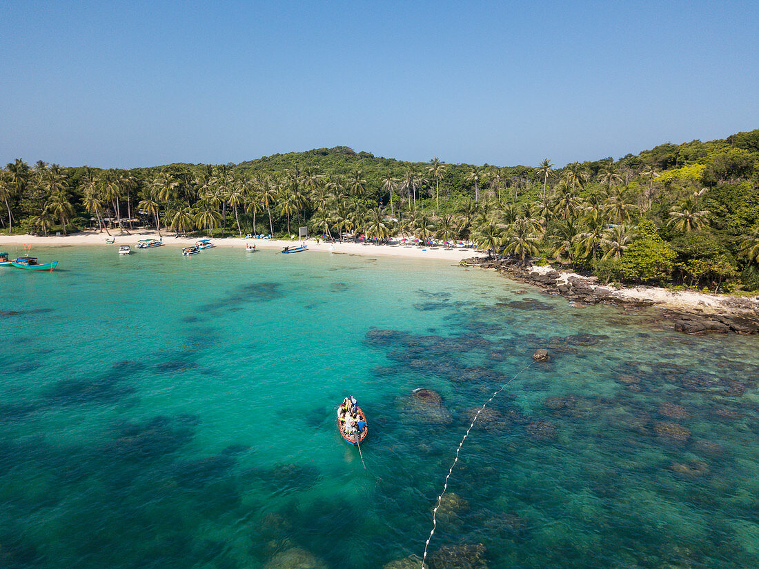 Aerial view of boats and beach with coconut palms, May Rut Island, near Phu Quoc Island, Kien Giang, Vietnam, Asia