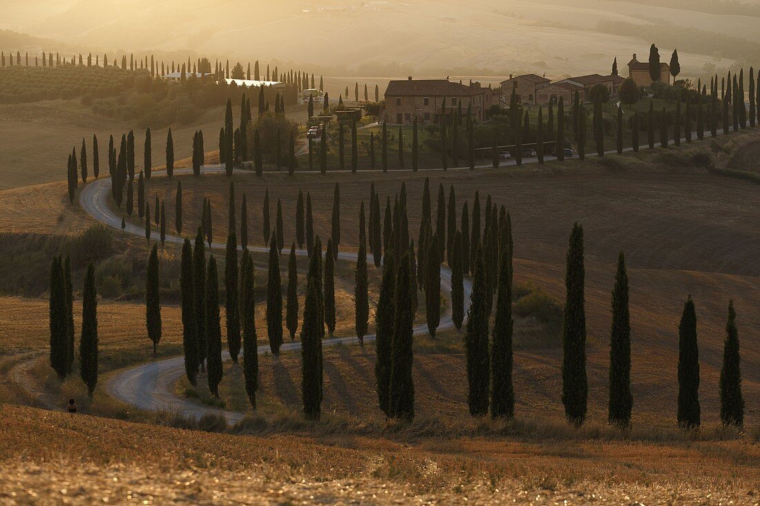 Baccoleno farmhouse at sunset,Asciano,Siena province,Tuscany,Italy.