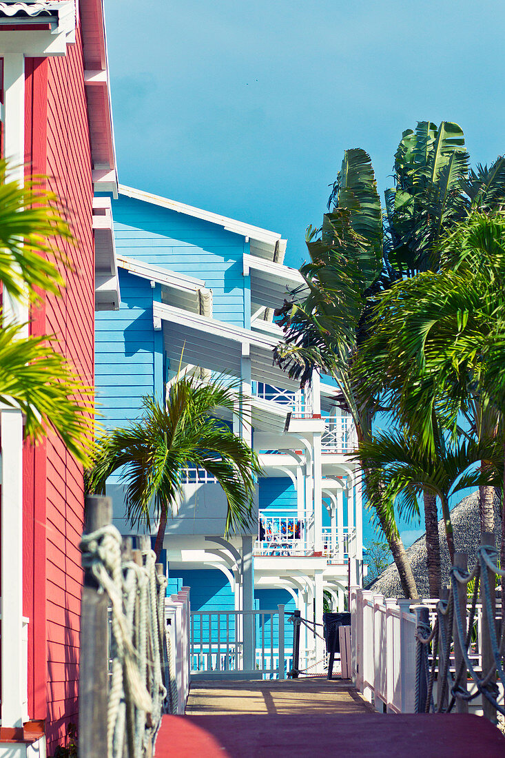 Colourful houses and palmtrees in a holiday resort in Varadero, Cuba