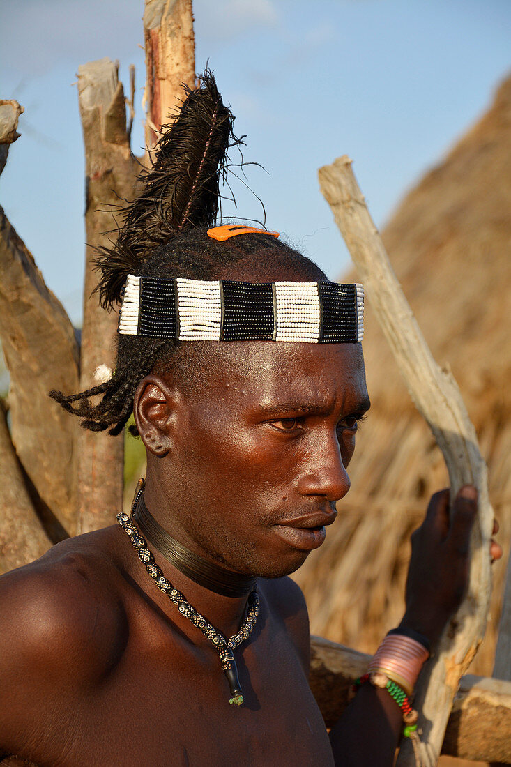 Ethiopia; Southern Nations Region; Hamer village near Turmi; young Hamer man with headdress