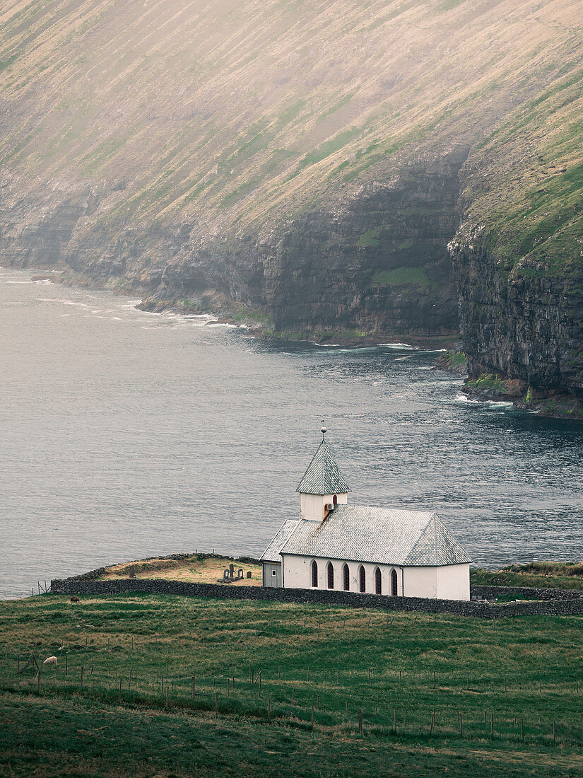 Church in the seaside village of Viðareiði on the island of Vidoy, Faroe Islands