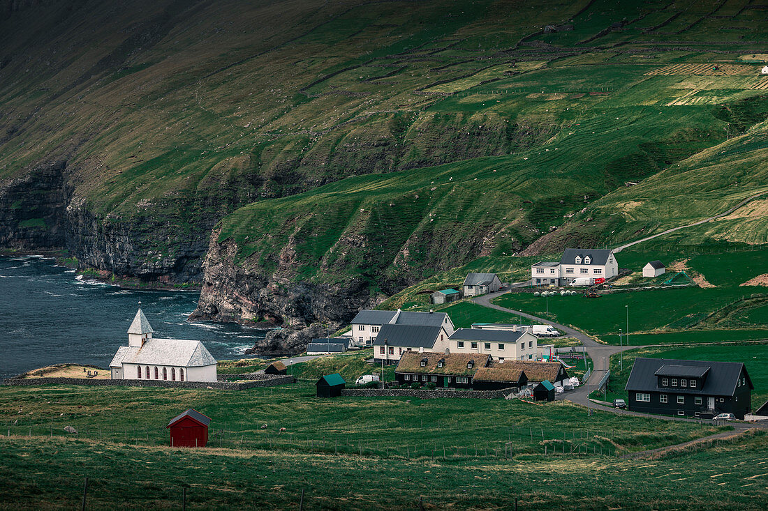 Church in the seaside village of Viðareiði on the island of Vidoy, Faroe Islands
