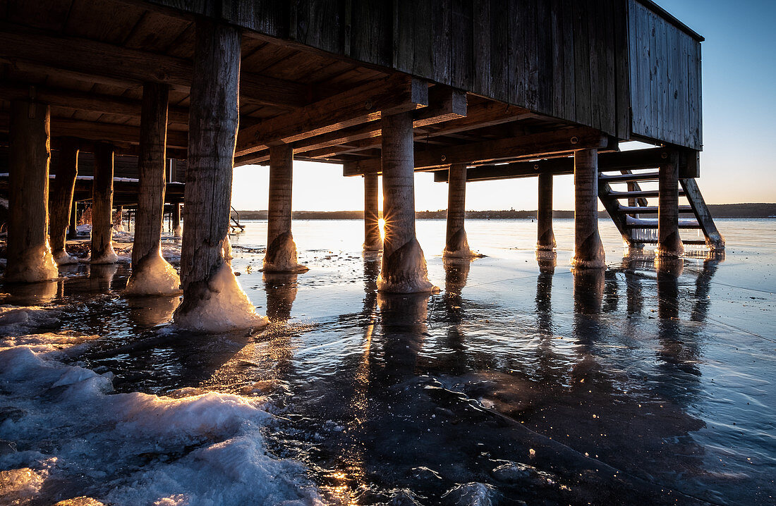 View of the icy stilt houses on Lake Ammersee, Fünfseenland, Upper Bavaria, Bavaria, Germany, Europe