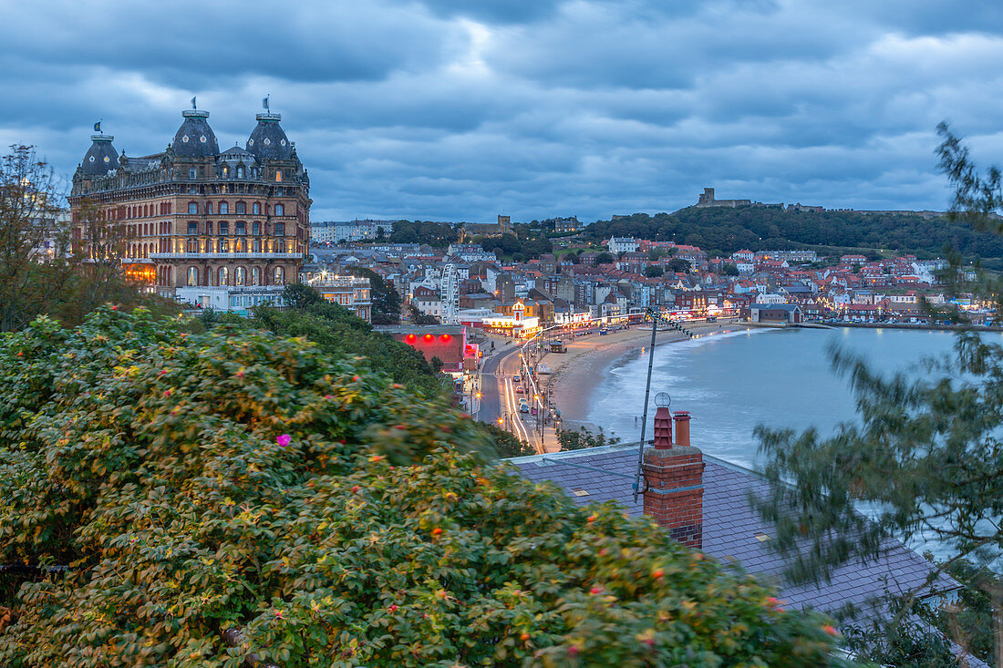 View of South Bay and Scarborough at dusk, Scarborough, North Yorkshire, Yorkshire, England, United Kingdom, Europe