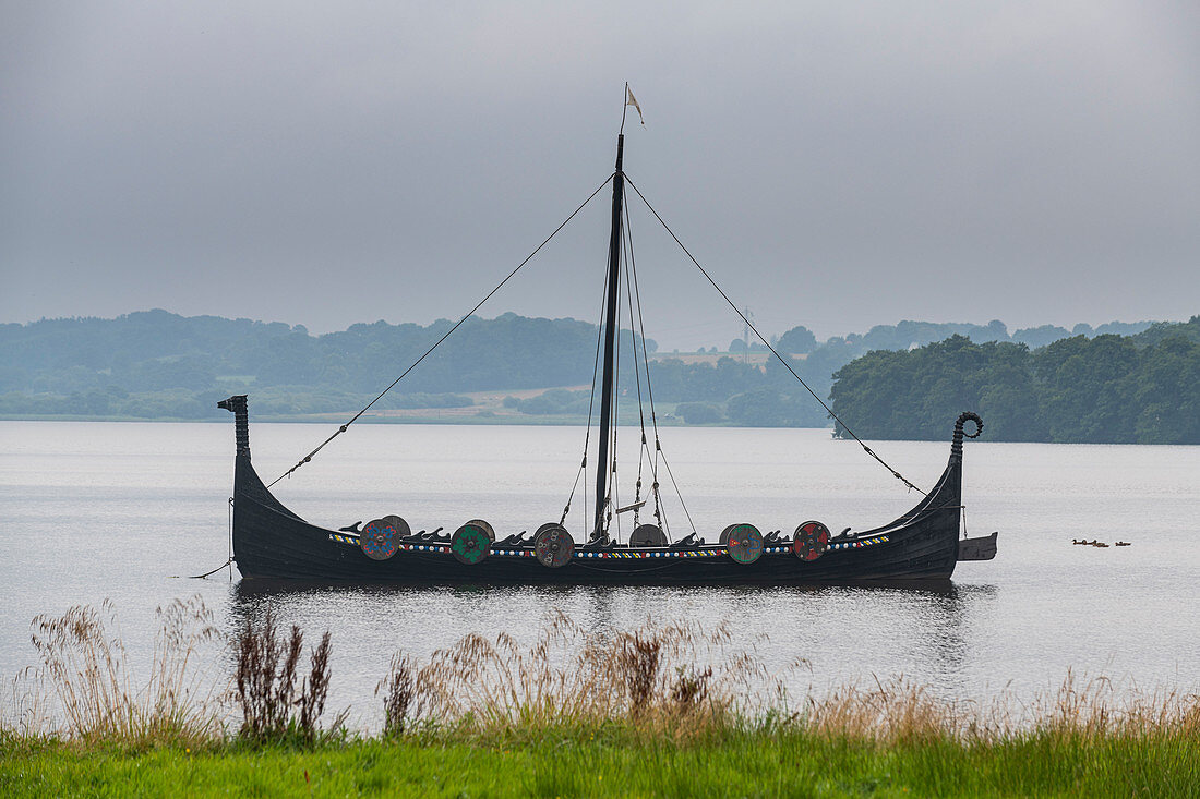 Viking boat on a lake,  Jelling Stones, UNESCO World Heritage Site, Jelling, Denmark, Scandinavia, Europe
