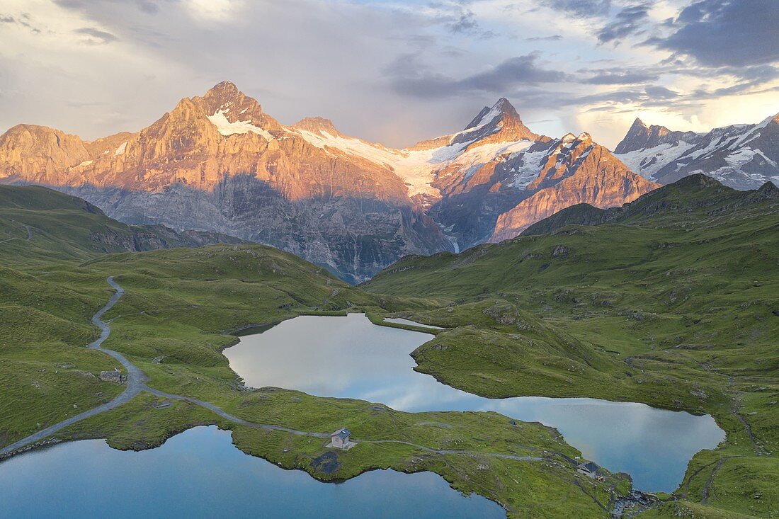 aerial view of Bachalpsee during a warm coloured sunset in summer time, Grindelwald, Canton of Bern, Switzerland, Europe