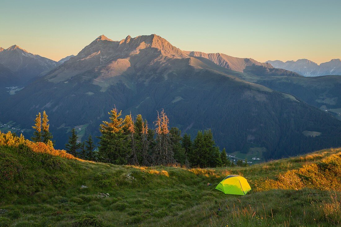 Wildcamping on the fields of Salfeins mountain with Rosskogel mountain in the background, Innsbruck Land, Tyrol, Austria, Europe