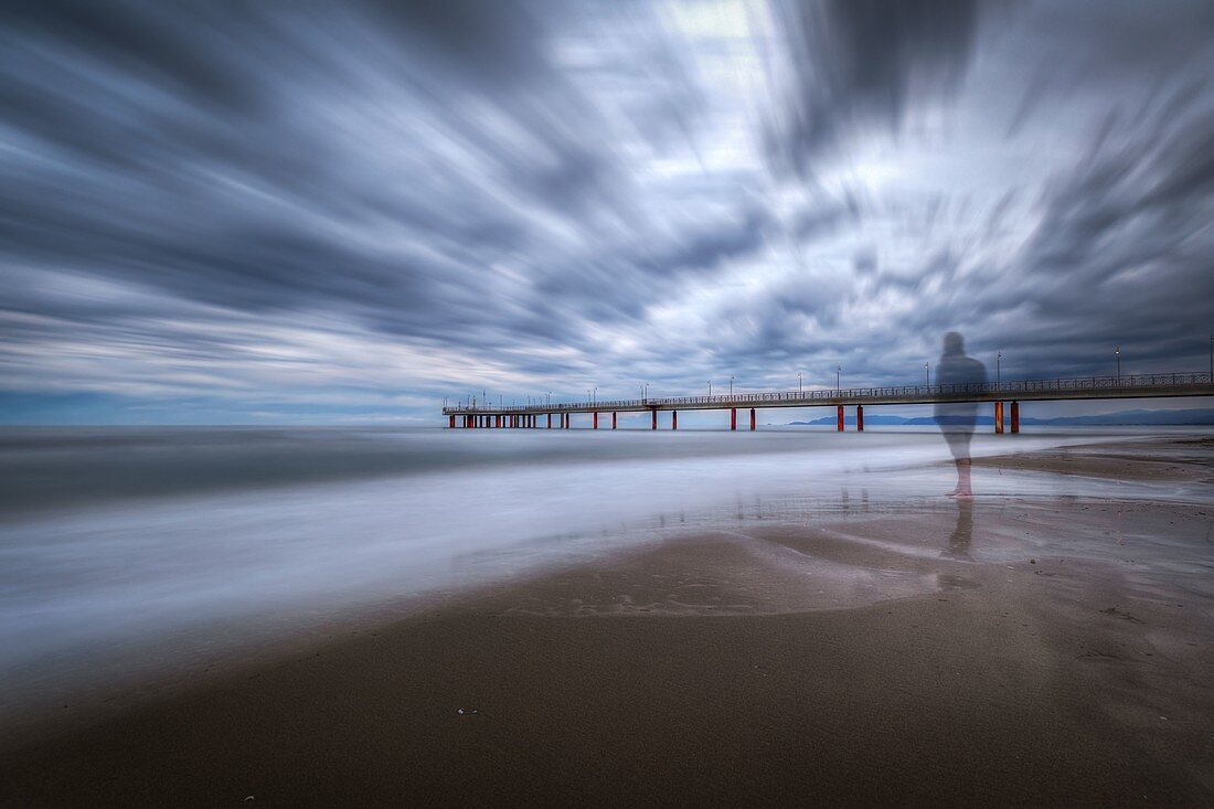 Long exposure on a cloudy day at the pier of Marina di Pietrasanta, Lucca province, Versilia, Tuscany, Italy, Europe
