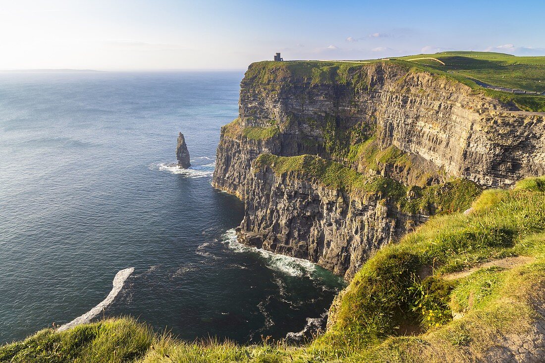 View of a sunset at the Cliffs of Moher. County Clare, Munster province, Ireland, Europe.