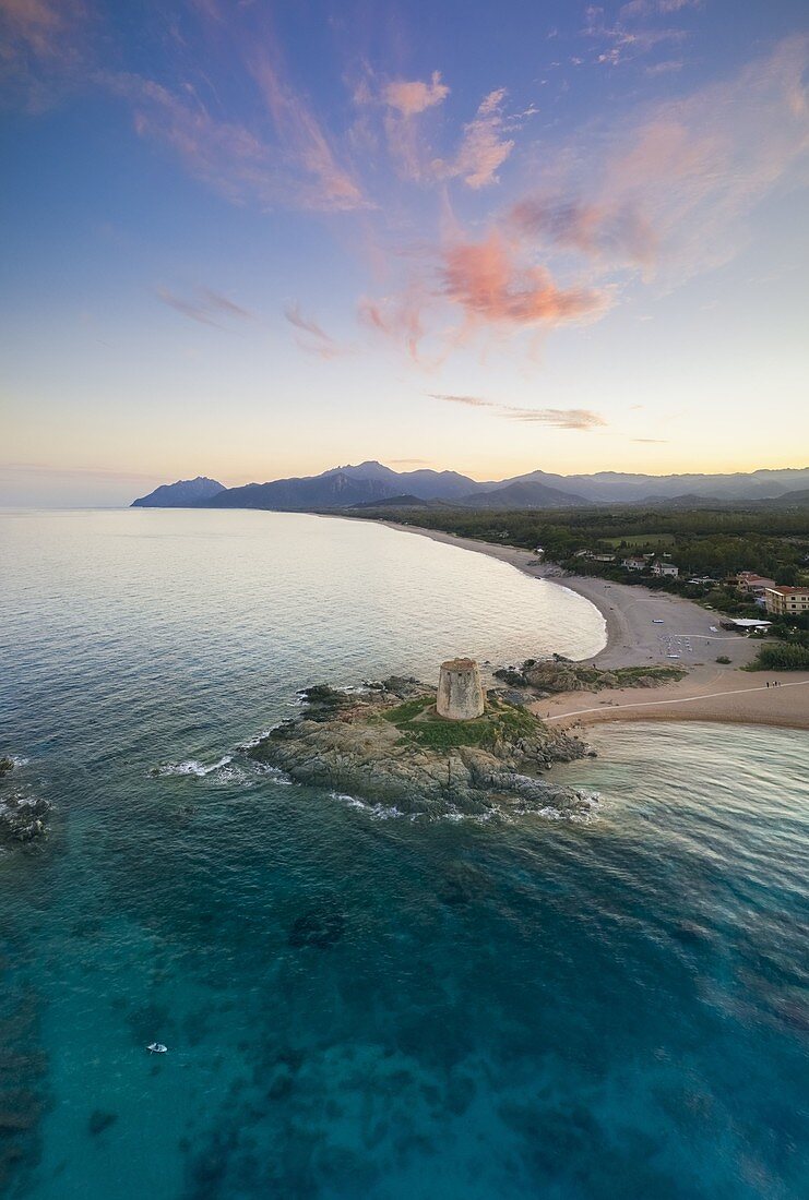 Aerial view of the old tower of Bari Sardo at sunset, Nuoro district, Sardinia, Italy.