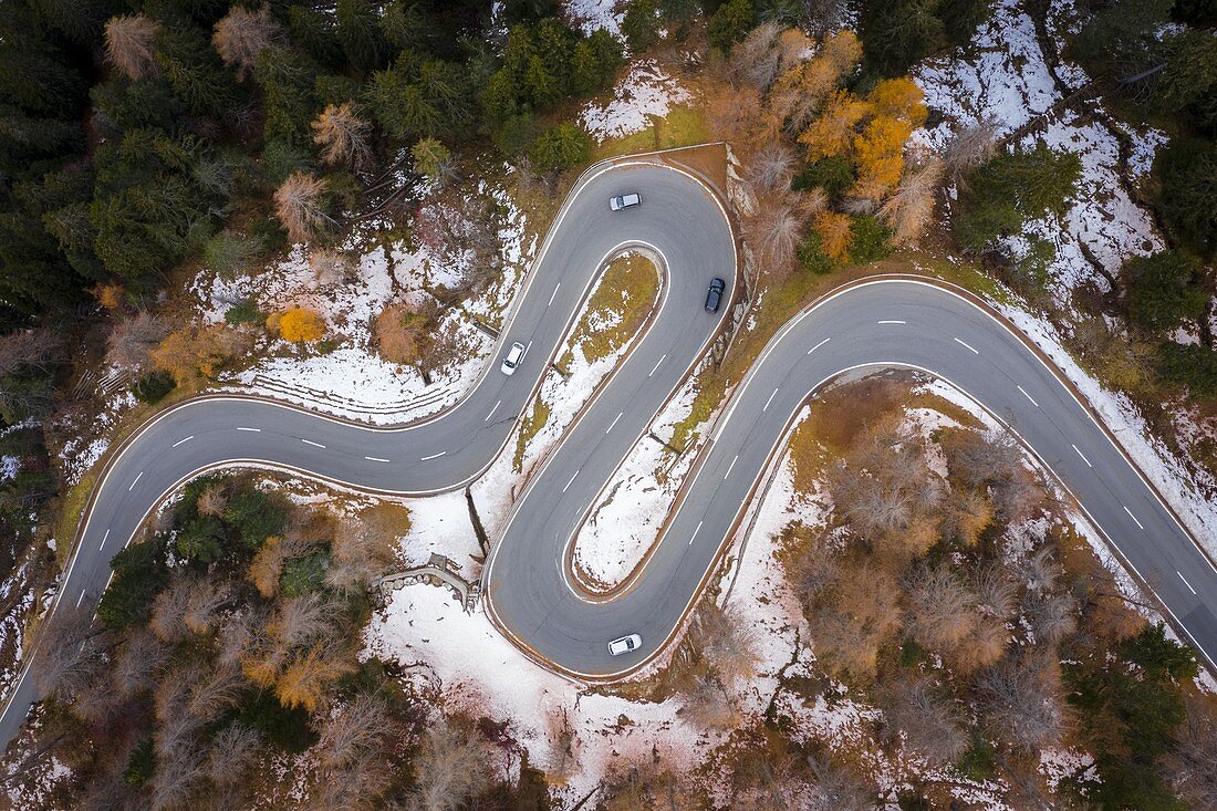 Aerial view of curves of Maloja Pass road in autumn, Bregaglia Valley, canton of Graubünden, Engadine, Switzerland.