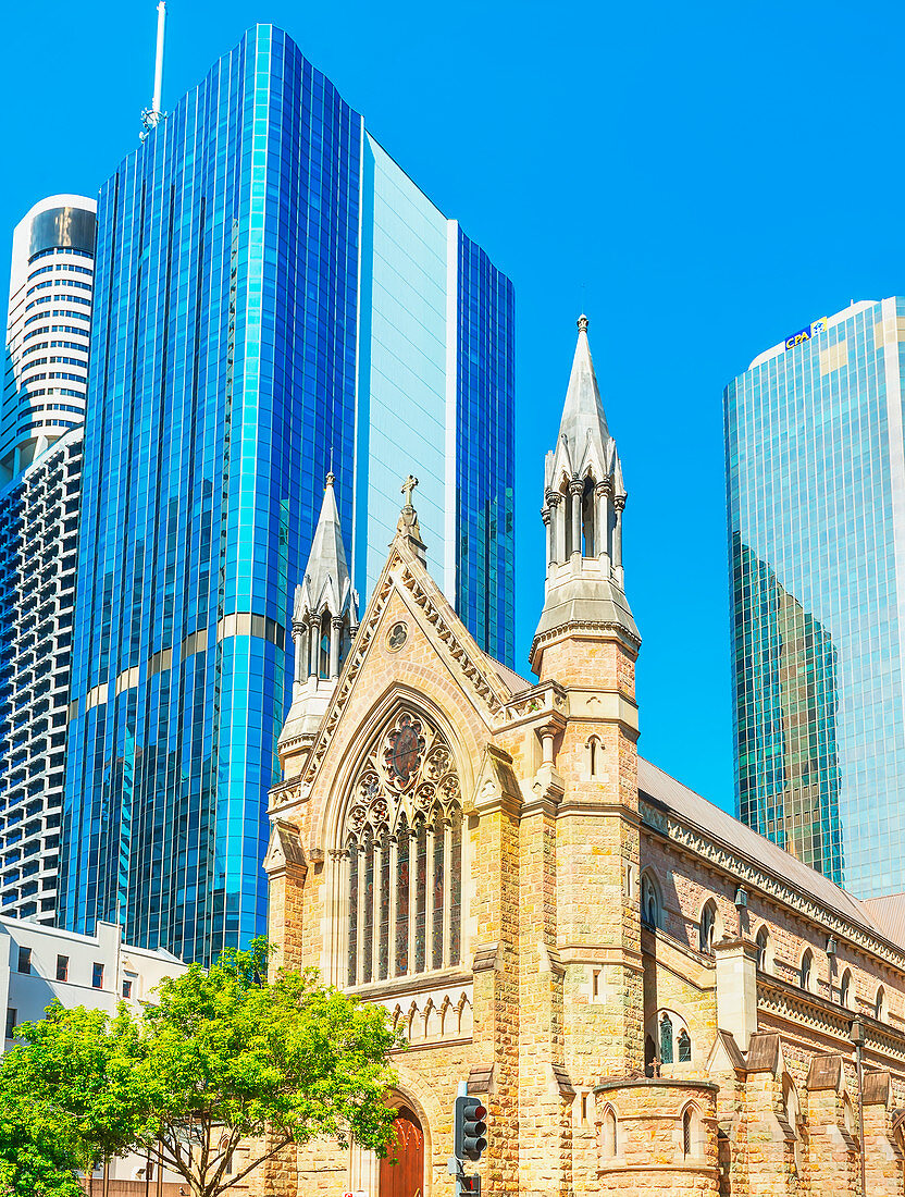 St Stephen's Cathedral dwarfed by glass skyscrapers, Brisbane, Queensland, Australia