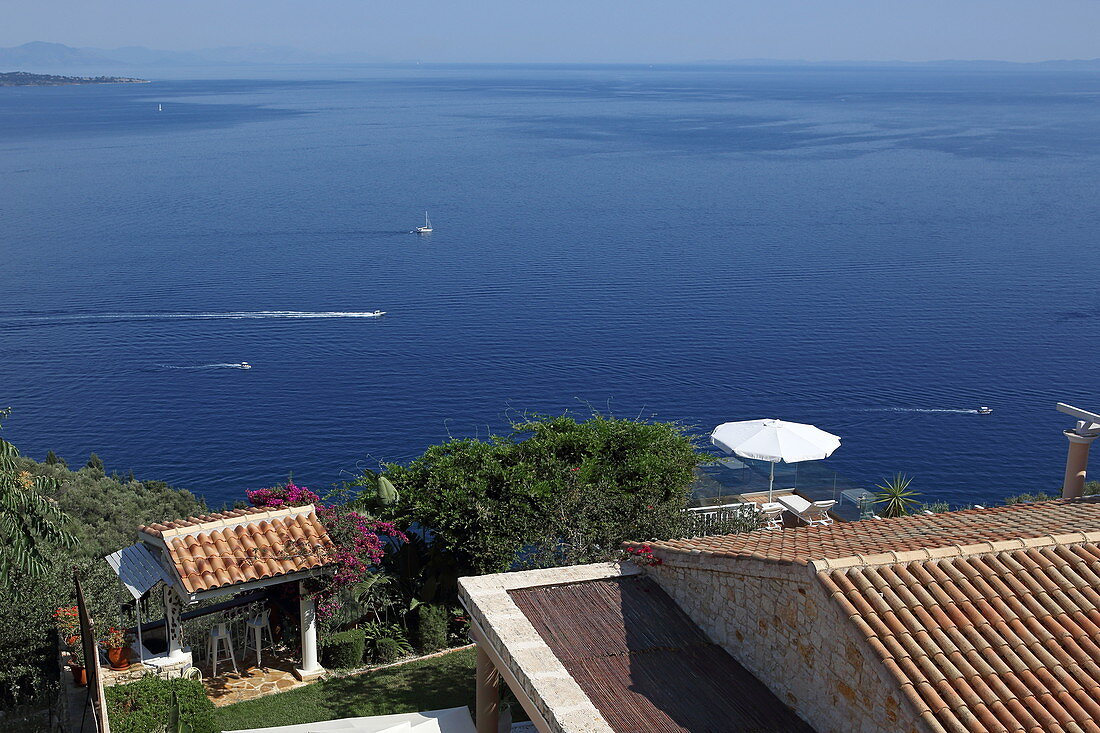 Holiday house above Nissaki Beach on the northeast coast of Corfu Island, Ionian Islands, Greece