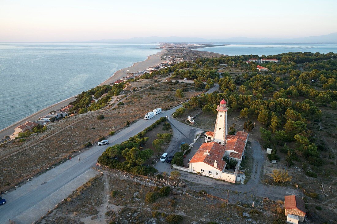 France, Aude, Leucate, Grand cap, natura 2000 area, in the foreground, the Leucate lighthouse, on the right the Leucate pond, on the left the sea, aerial view