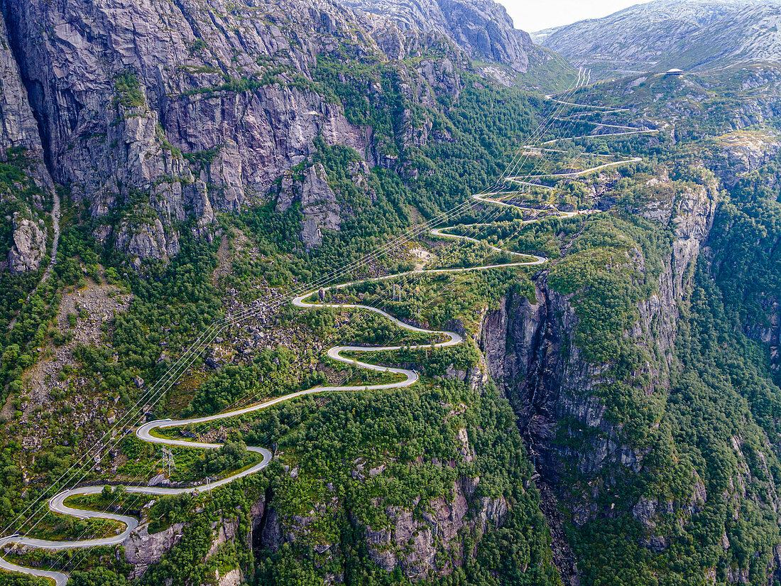 Zigzag road leading down to Lysebodn, at the end of Lystrefjord (Lysefjord), Rogaland, Norway, Scandinavia, Europe