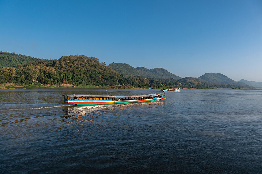 Tourist excursion boats on Mekong River, Luang Prabang, Luang Prabang Province, Laos, Asia