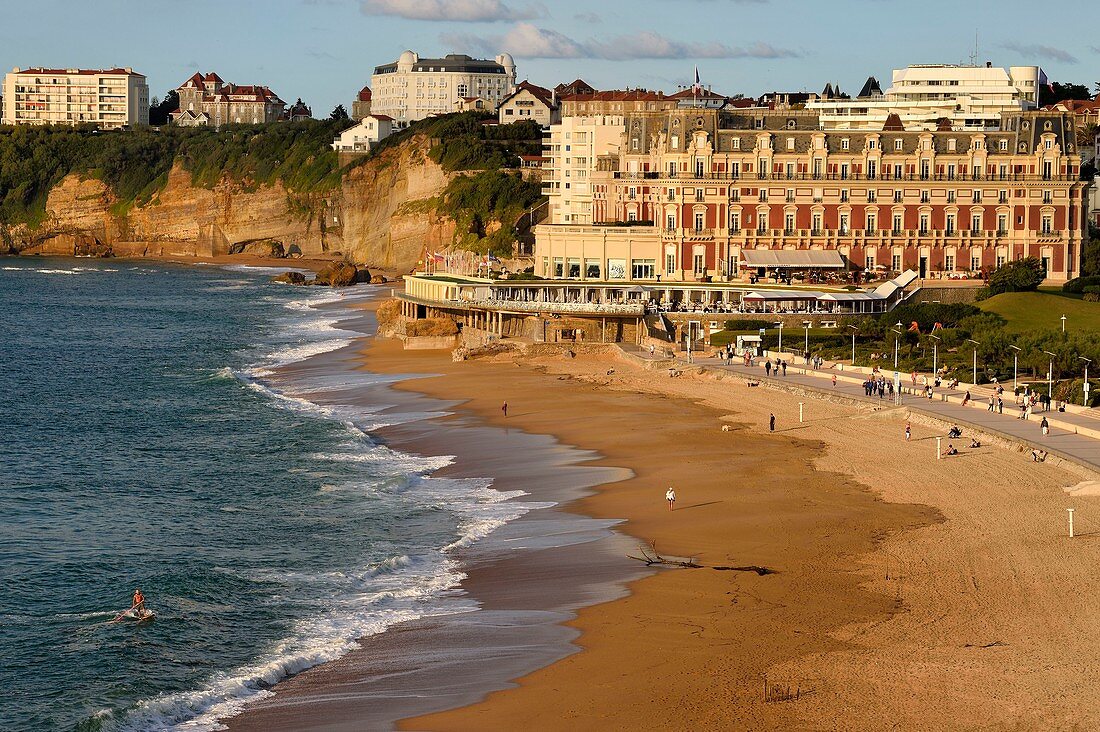 France, Pyrenees Atlantiques, Basque Country, Biarritz, the Grande Plage (town's largest beach) and the Hotel du Palais, stand up paddle
