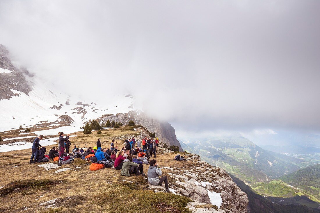 France, Isere, Vercors Regional Natural Park, National Highlands Vercors Nature Reserve, group of hikers at Pas des Chattons