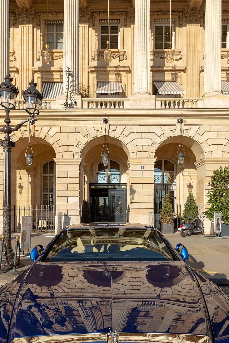 France, Paris, facade of the Crillon Hotel Place de la Concorde and luxury car