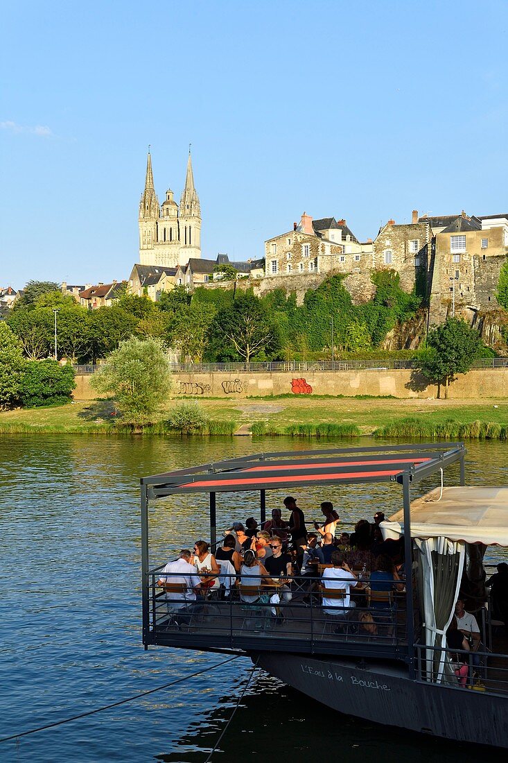 France, Maine et Loire, Angers, the river port, restaurant pizzeria L'eau à la Bouche with Saint Maurice cathedral