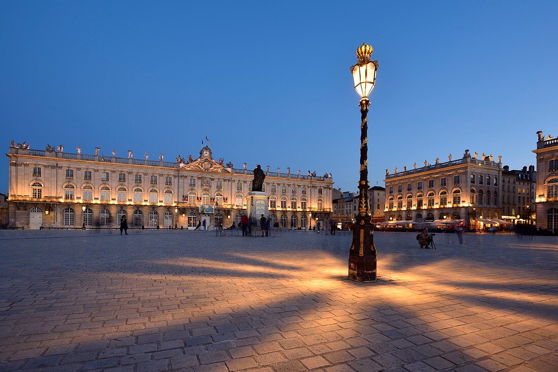 France, Meurthe and Moselle, Nancy, place Stanislas (former Place Royale) built by Stanislas Leszczynski, king of Poland and last duke of Lorraine in the eighteenth century, classified World Heritage of UNESCO, statue of Stanislas in front of the town hall by night