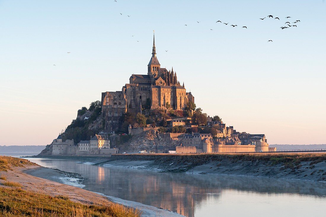 France, Manche, Mont Saint Michel Bay listed as World Heritage by UNESCO, Abbey of Mont Saint Michel and River Couesnon