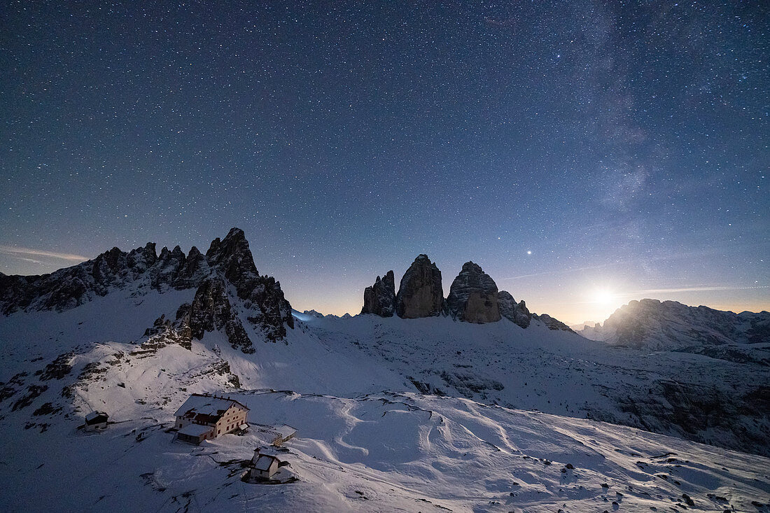 Monte Paterno, Tre Cime di Lavaredo and Rifugio Locatelli hut lit by moon, Sesto Dolomites, South Tyrol, Italy, Europe