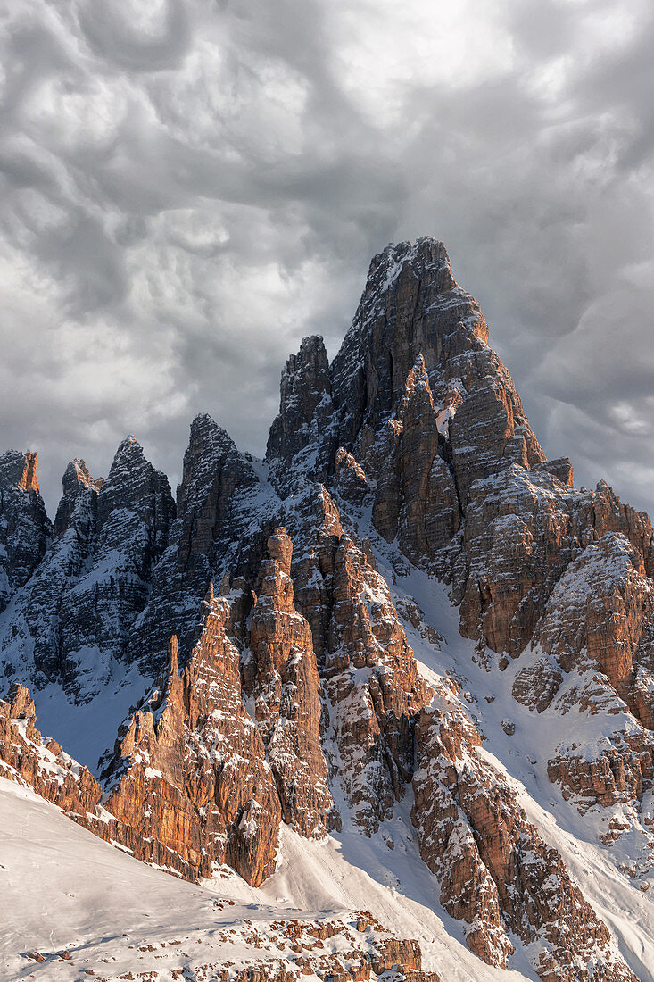 Clouds at sunset over the majestic rocks of Monte Paterno (Paternkofel), Sesto Dolomites, Trentino-Alto Adige, Italy, Europe