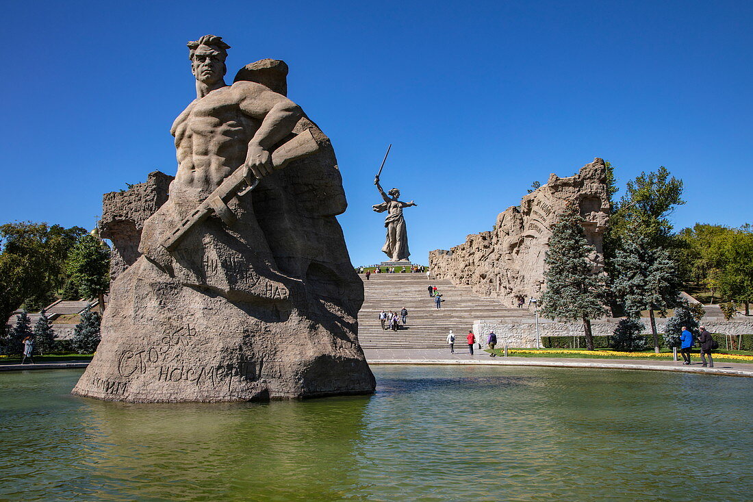 Statues in pond with fountain below the steps to the huge Motherland Ruf statue, Volgograd, Volgograd District, Russia, Europe