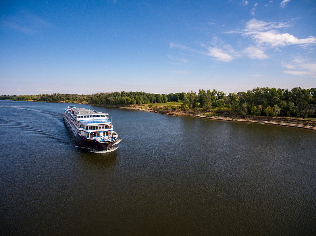 Aerial view of river cruise ship Excellence Katharina (formerly MS General Lavrinenkov) on Volga River, near Sady I Dachi, Ostrakhan District, Russia, Europe