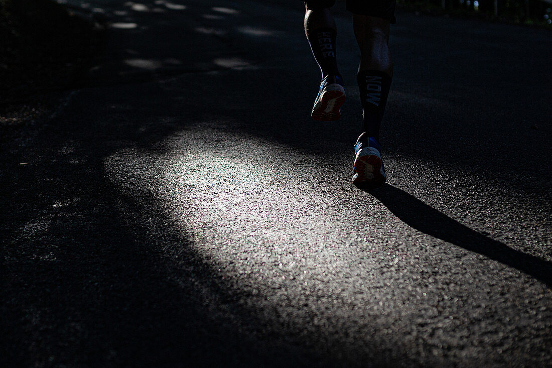 Runner stepped on a street, running, sports, street