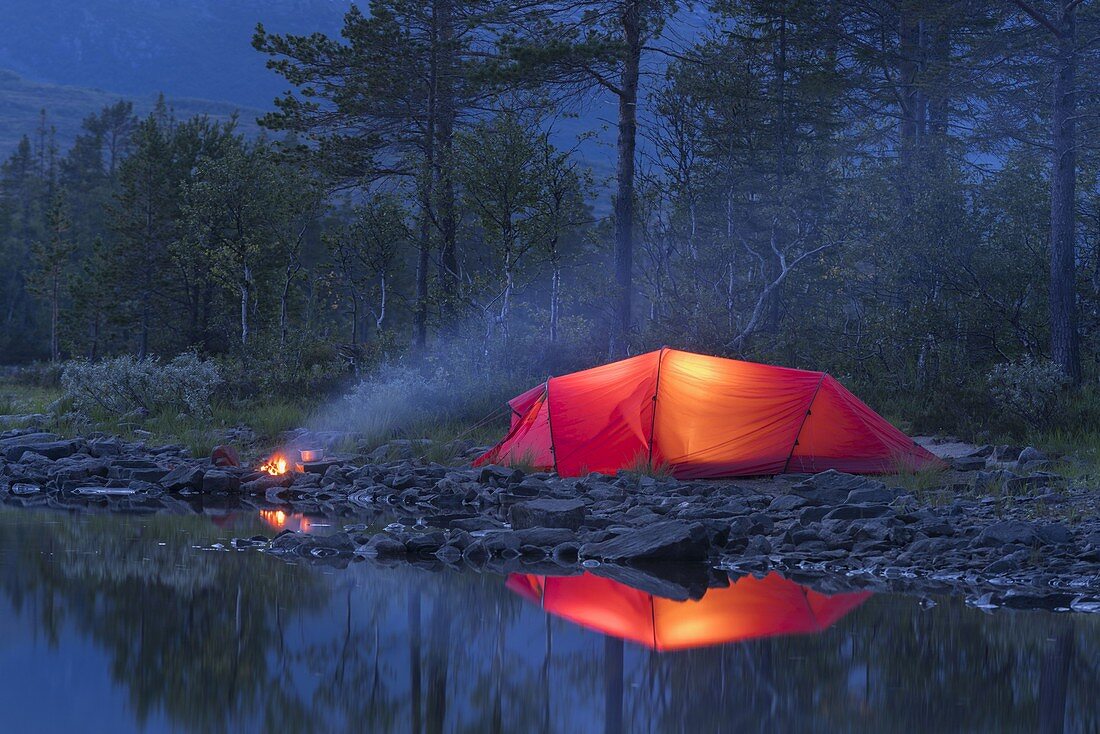 Red tent, campfire, Sefrivatnet, Tosfjellet, Nordland, Norway
