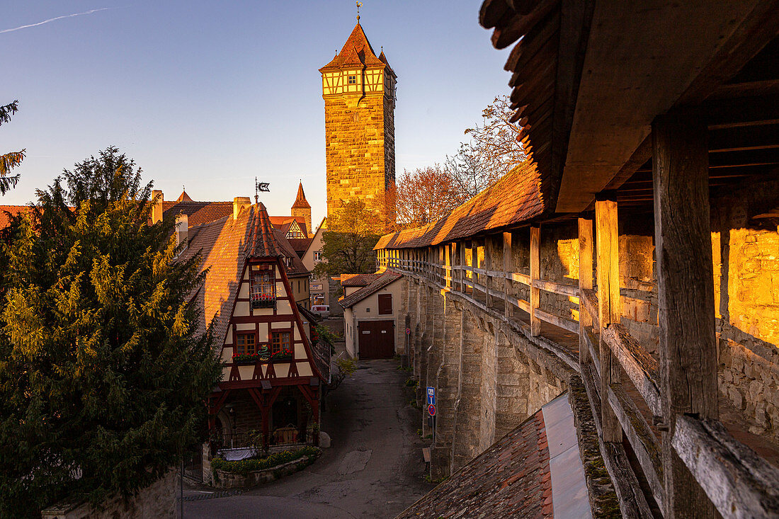 Historic city wall of Rothenburg ob der Tauber in the evening light, Middle Franconia, Bavaria, Germany
