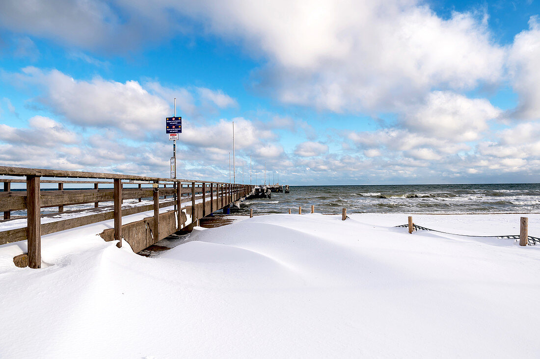 View of the snow-drifted pier in Dahme, Baltic Sea, Ostholstein, Schleswig-Holstein, Germany