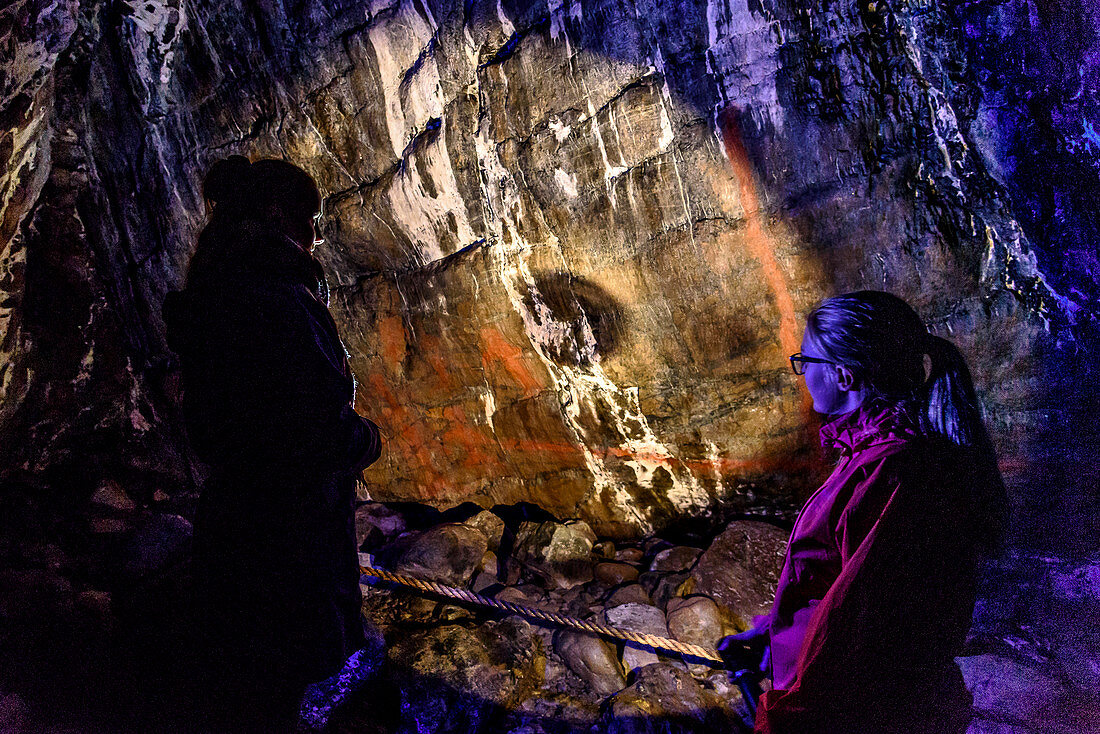 Guided tour of the paintings in the Solsem Cave on the island of Leka, Norway