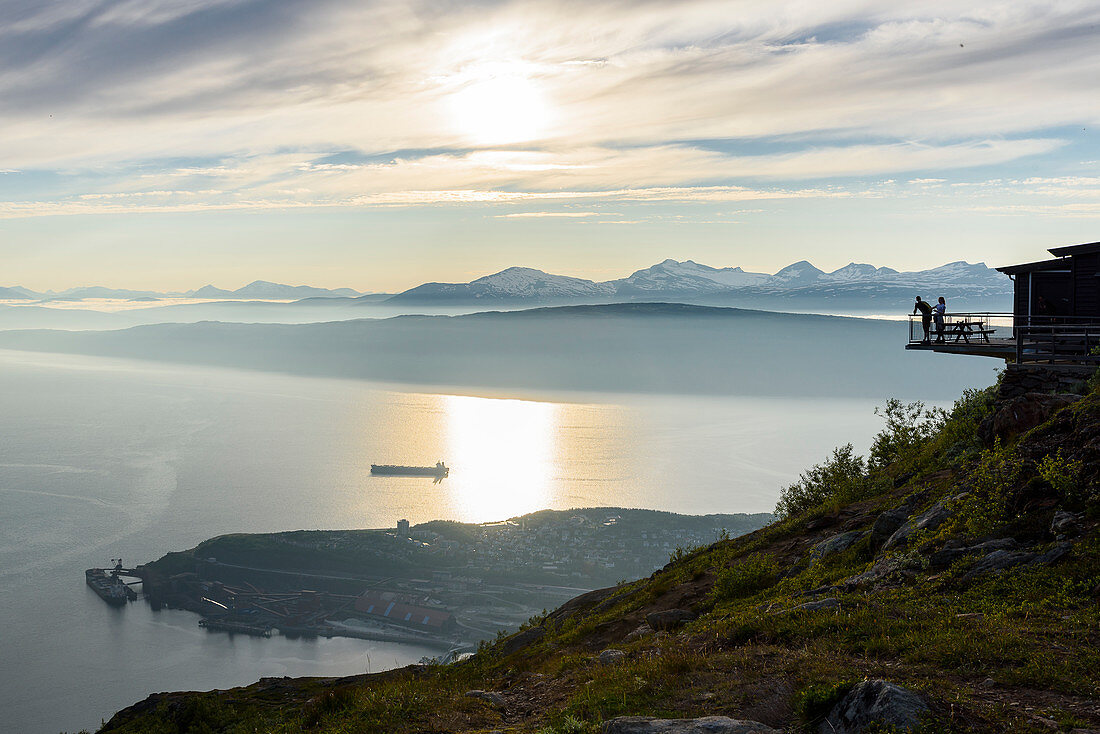 Young couple on terrace, from Fagernesfjell you have a great view of the Ofotfjord and, Narvik, Norway