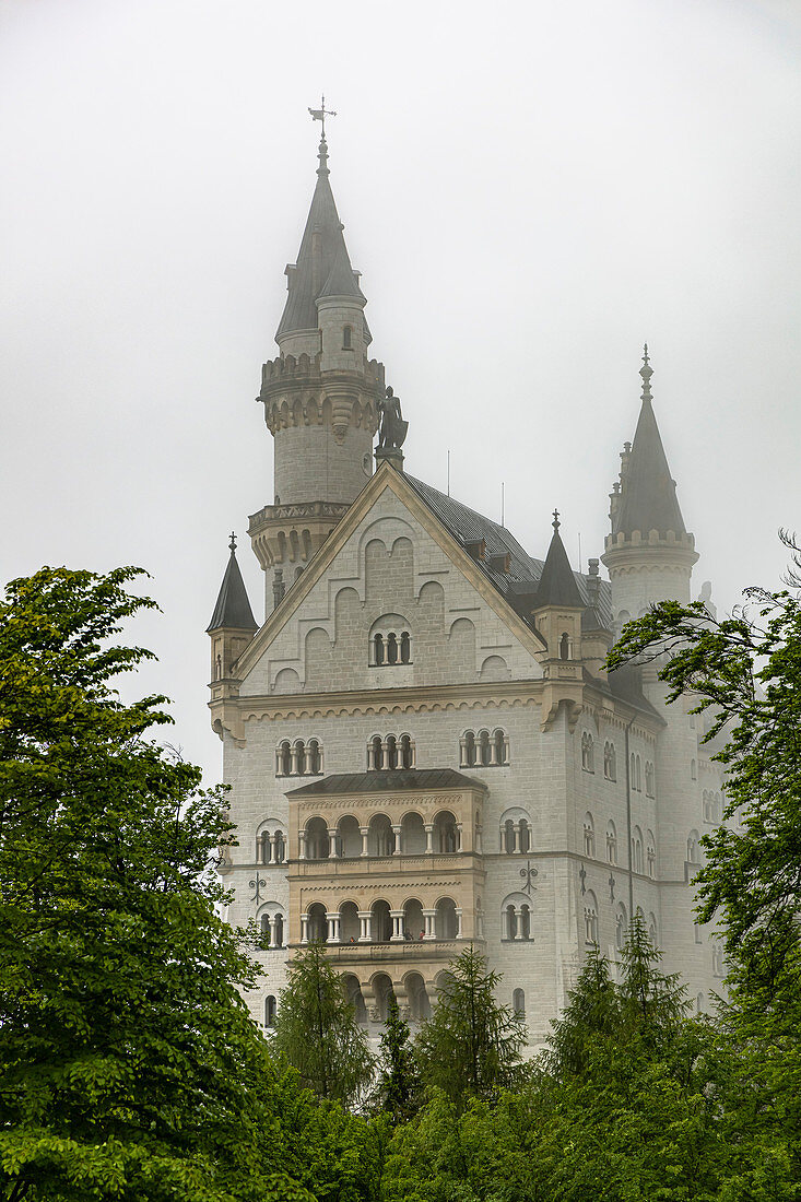 View of cloud-covered Neuschwanstein Castle, Schwangau, Upper Bavaria, Germany