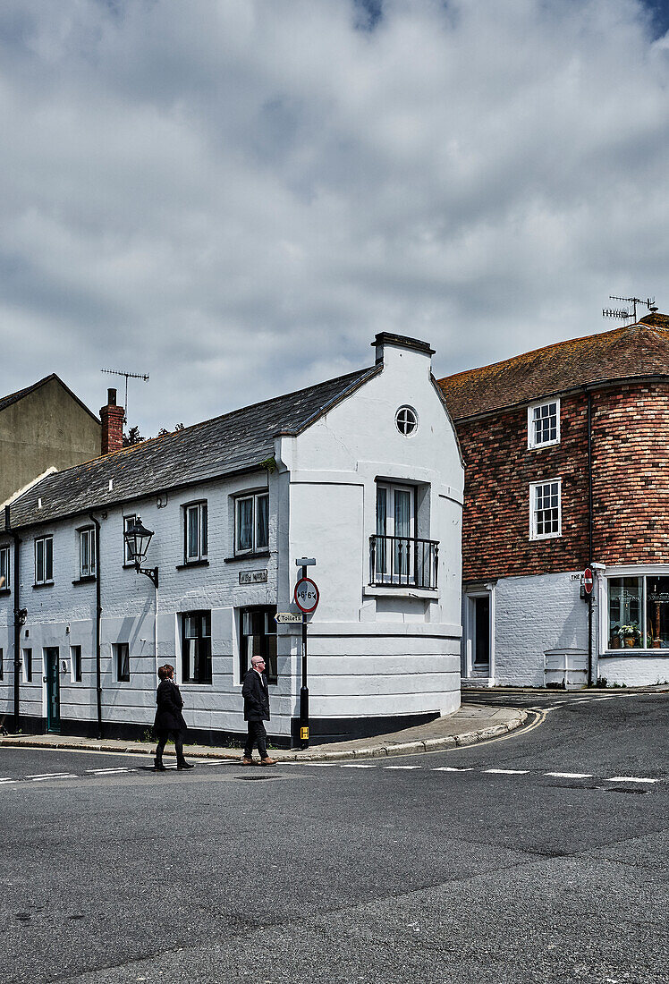 A streetscape with tourists in Wish Ward in Rye, East Sussex, UK.