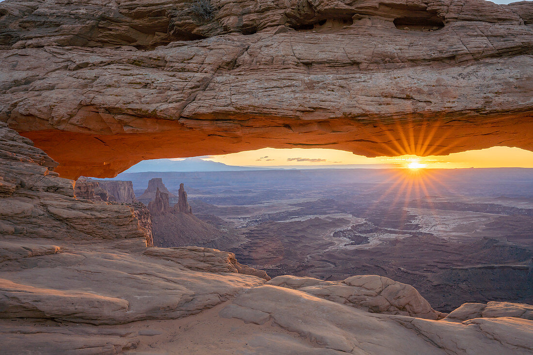 Close up view of canyon through Mesa Arch at sunrise, Canyonlands National Park, Utah, United States of America, North America