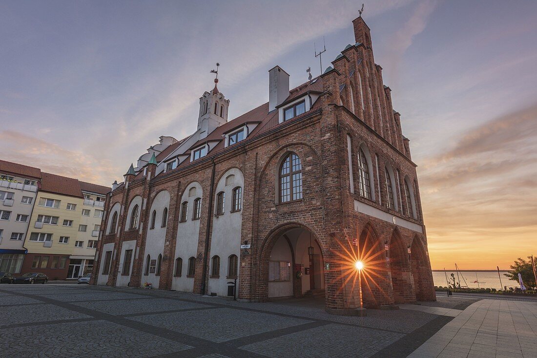 Poland,West Pomerania,Kamien Pomorski,Historic town hall at dusk