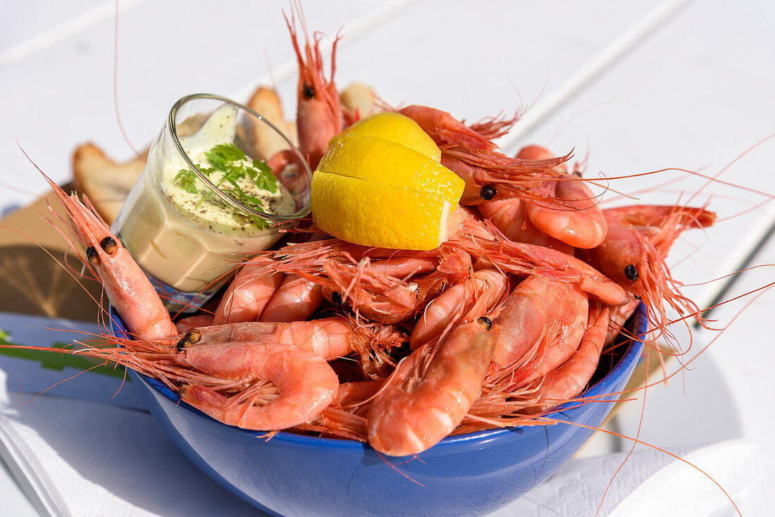 Fresh shellfish as a meal in the Ravnkloa fish hall, Trondheim, Norway