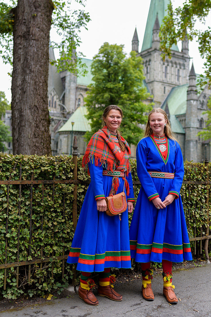 Sami in costume in front of the cathedral, Trondheim, Norway