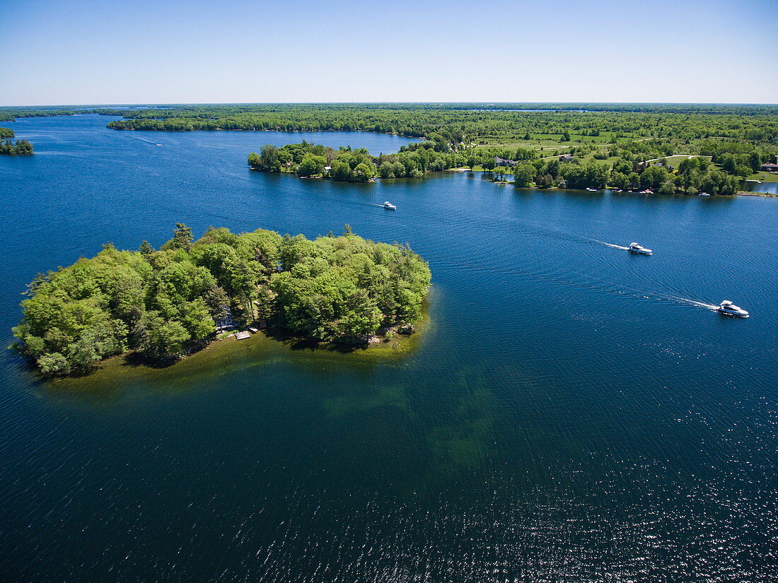 Aerial view of island and three Le Boat Horizon houseboats, Big Rideau Lake, Ontario, Canada, North America